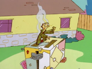 Ed gesturing Eddy over to his toaster.