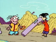 Edd trying to blow through the pipe.