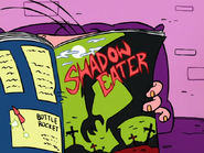 Eddy reading a Shadow Eater comic.