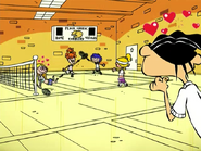 The girls playing badminton.