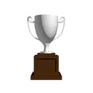 A larger silver cup with fancy handles.