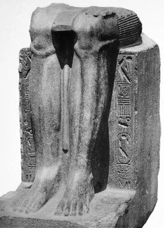 Remains of a statue of the  reappropriated by Khyan, with his cartouche inscribed on the sides over an erasure