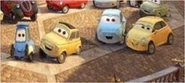 Franca y Francesca con Luigi y Guido en el poster de Cars 2.