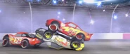 Lightning McQueen landing right on Claude Scruggs and ready to take off