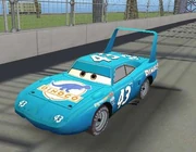 El Rey conduce en el Autódromo de Palm Mile.