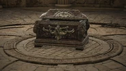 The chests used in Farum Azula, decorated with a floral pattern and small impaled beasts.