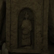 A tree-headed horned figure