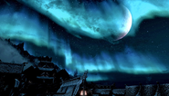 An aurora and half moon over Windhelm.