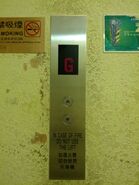 A set of US91 call buttons on a call station in a Kone elevator installed in a carpark.