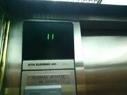 Series 1 car floor indicator on a Otis Elevonic 401 elevator.