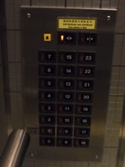 1990s Hitachi elevator door control buttons.