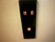 Kone KDS Design D hall station with orange LED floor indicators.