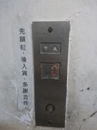 1979 vandal resistant Otis Asian Lexan hall station in Hong Kong.