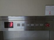 Unknown generic buttons outside the dumbwaiter (Bali, Indonesia)