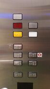 Schindler M-Line Buttons mounted on a Schindler 5500 elevator.