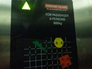 2000s Dong Yang nameplate with directional arrows.
