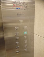 Unknown STEP series buttons on a modernized Otis elevator in Hong Kong.