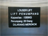 Some elevators may have the capacity badge written in Indonesian instead of English.