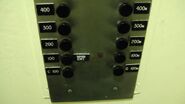 Old Otis larger black buttons without numbers in Rush Rhees Library, Rochester, NY.