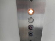 White buttons on FIAM elevator from the 1980's.