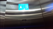 Otis LCD segments display car floor indicator.