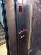 Unknown STEP-like buttons in a ThyssenKrupp elevator in Hong Kong.