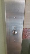 Dewhurst US100 landing button used in a Express Lift in Block 5 Boon Keng Road HDB, Singapore.