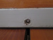 LG elevator U-shaped door keyhole, located on the upper door frame.