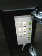 Inspection switches on a service cabinet panel of Schindler 3300 AP elevator.