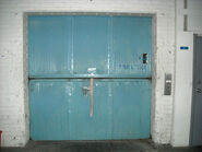 Older American freight elevator typically have two vertical landing doors.