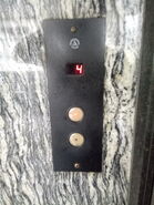 Late 1980s/Early 1990s Atlas hall station with round white buttons (illumination is in the middle of the button)