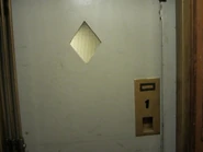 Vintage Otis swing door inside view