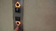 Otis triangle shaped touch sensitive buttons used on an Otis Autotronic elevator call station in the Sibleys Tower in Rochester, NY.