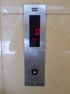 Standard M-Series call station with digital-segmented display floor indicator (for one elevator).