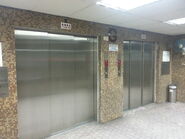 Fujitec freight elevator with 3 speed sliding telescopic door in Hong Kong.