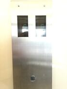 Dewhurst US89 Barrel call button, used on two OTIS Lexan elevators in Wellington, New Zealand.