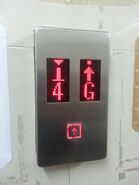 STEP PB200 buttons on a Otis elevator.