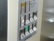 Deve TKID car station panel with protruded buttons. (credit: elevatorbob's Elevator Pictures).