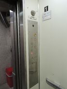 Mitsubisi elevators with modern Everbright fixtures, but the floor button panel is actually a reuse of the original one.