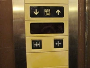 1990s Toshiba elevator door control buttons.