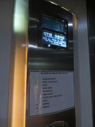 Otis LCD floor indicator in Singapore with the "exit the elevator when the doors opening" indicator installed.