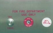 Fire service mode key switch typically found in elevators in North America.