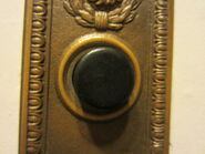 1920s Otis hall station button.