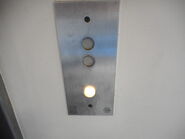 White buttons on FIAM elevator from the 1980's.