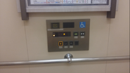 Japanese Hitachi handicap car station in Japan, with B95 buttons.