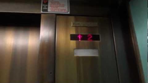 Dover traction elevators with the Traditional fixtures from 1985 (Albuquerque, NM). Note the dot matrix floor counters.