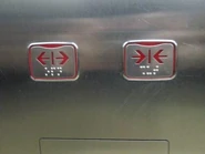 Sigma elevator door control buttons.