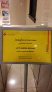 Schindler elevator maintenance sign in Thailand.