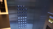 2011 Mitsubishi black and white square buttons (Credits to YouTube user Heritage Elevators).