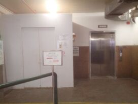 An elevator is being replaced into  in 2013. The former elevator was a 1980s FIAM traction elevator. The right one is already modernized.